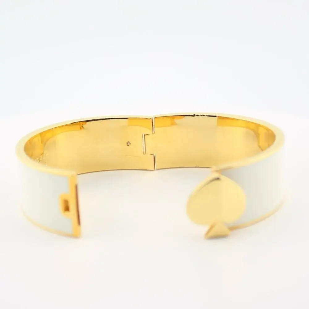 Kate Spade White Enamel Gold Tone Hinged Spade Bangle Bracelet - Picture 3 of 10
